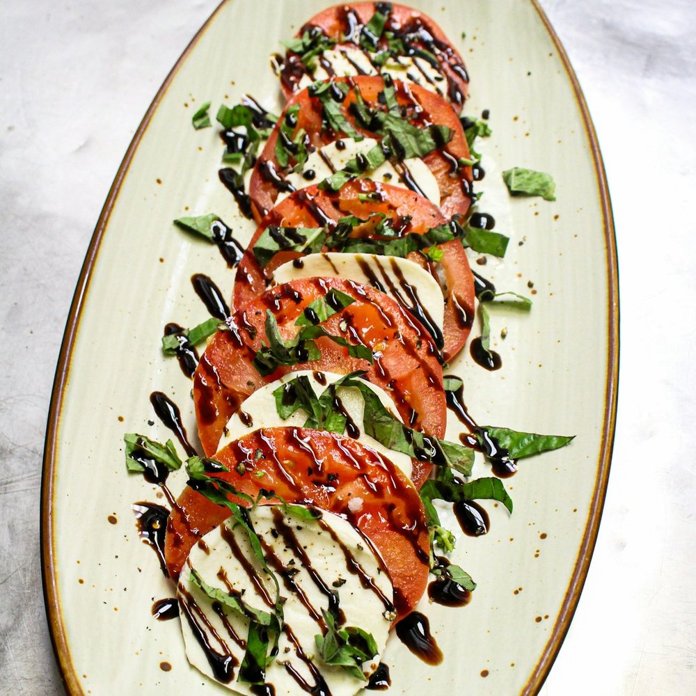 Caprese salad with mozzarella and tomato
